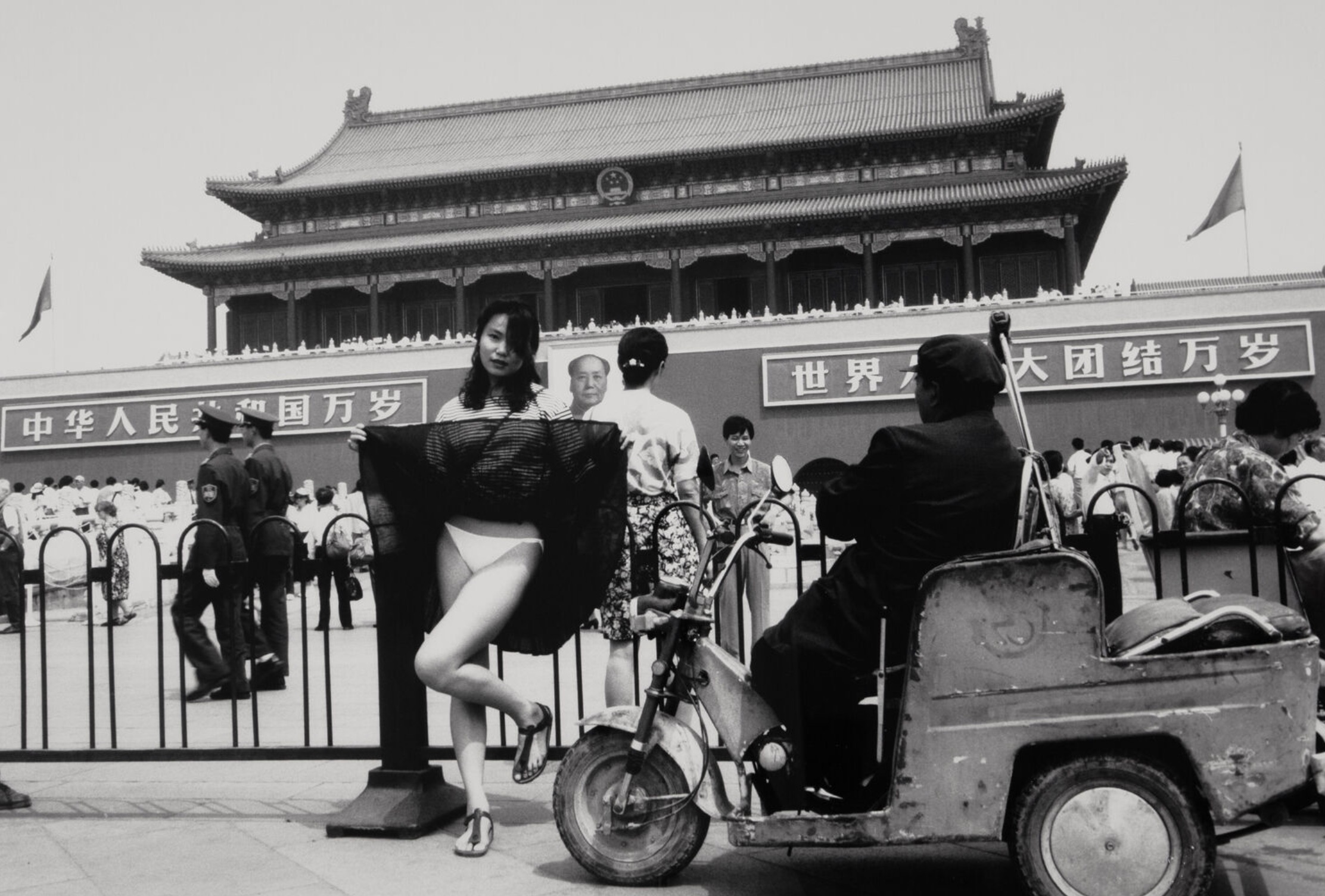 Photograph titled June 1994 by the artist Ai Weiwei. He and the artist Lu Qing created a parody of a tourist photograph in Tiananmen Square under the gaze of Mao - and a remembrance of the tragedy five years earlier that ended the student movement.